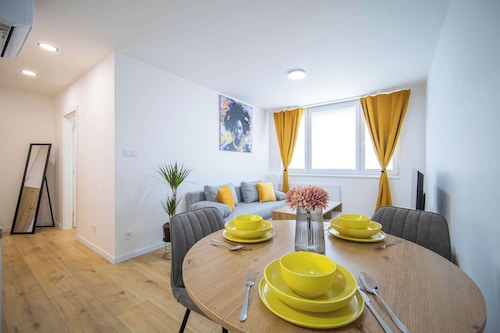 Boutique Living - Yellow Accent Apartment