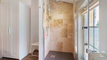 Shower, hair dryer, towels