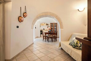 Interior - 19th-century trulli complex among vineyards (Martina Franca)