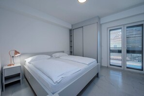 2 chambres, fer et planche à repasser, Wi-Fi, draps fournis