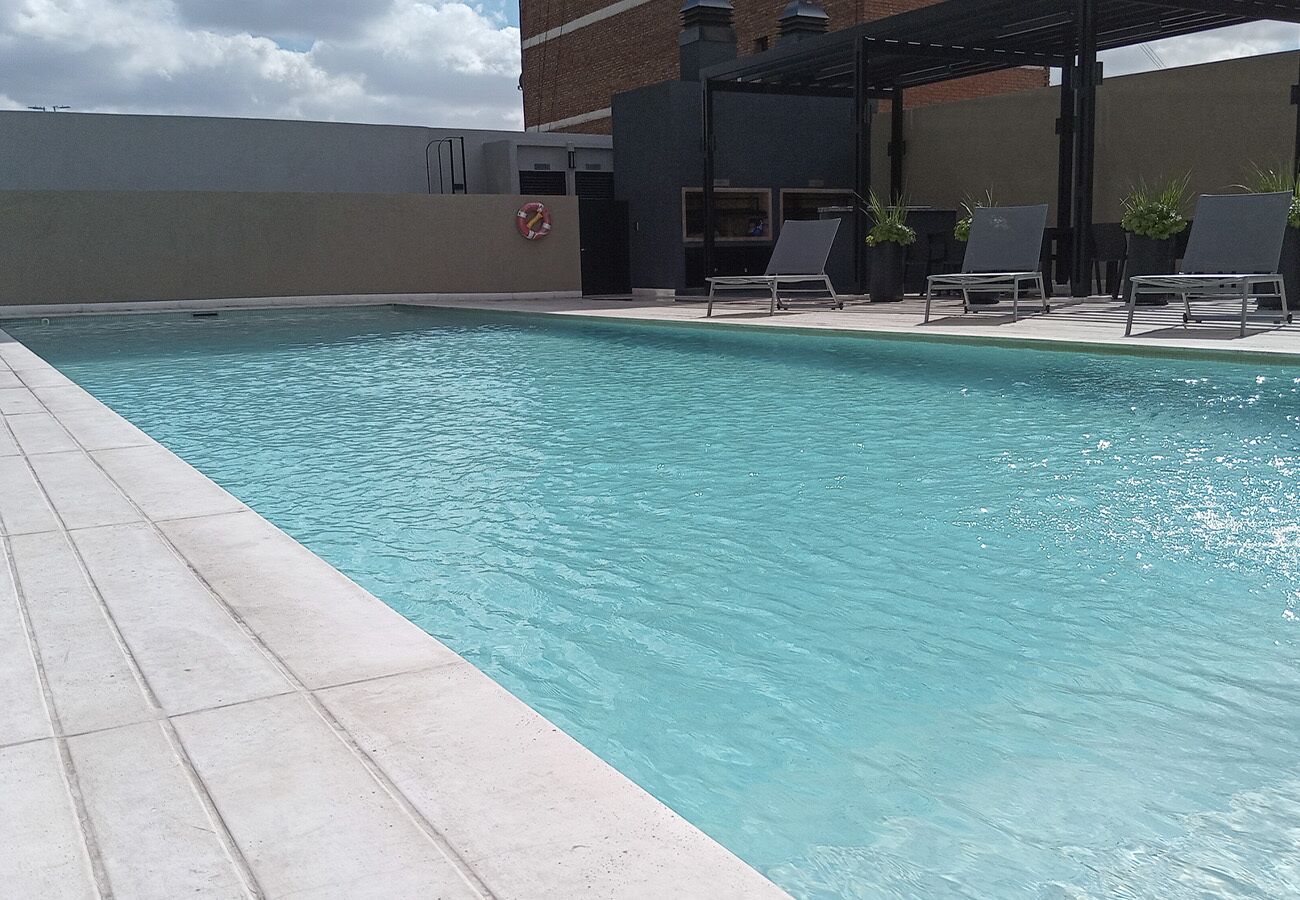 Seasonal outdoor pool, pool loungers