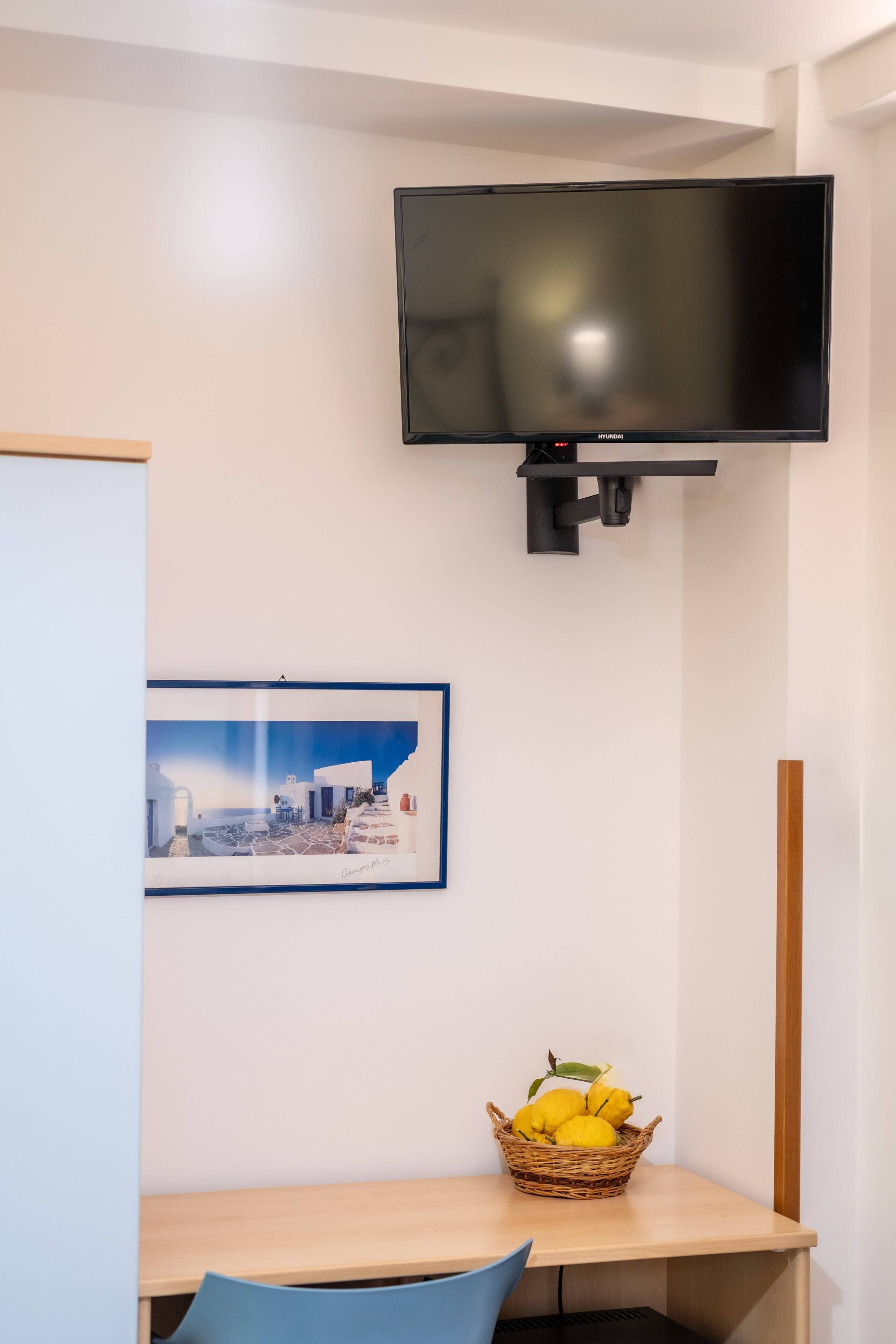 Habitación doble, 1 cama de matrimonio con sofá cama, vistas al patio | Interior
