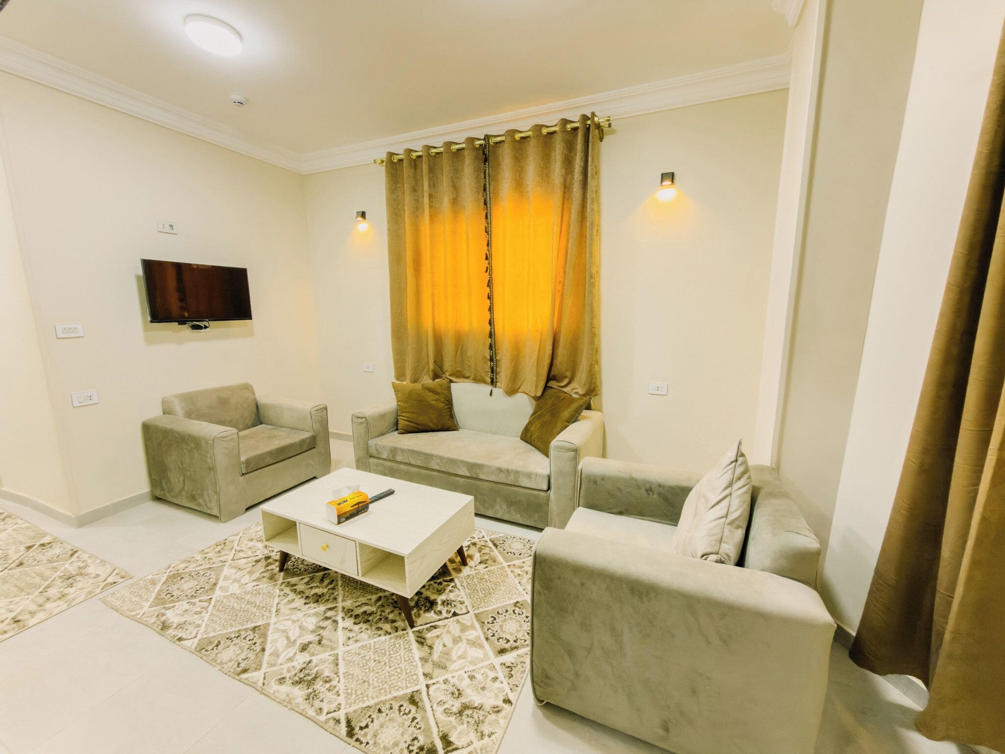 Family Apartment, Mountain View | Living area | 40-inch LED TV with satellite channels