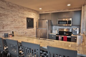 Fridge, microwave, oven, stovetop - Spacious 3 bdrm, 2 Bath Plus Loft, 1630 Sq Ft.  Many onsite amenities with Golf/Skiing near by! (Harbor Springs)