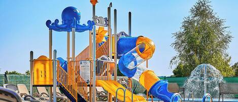 A water park with slides and a pool.