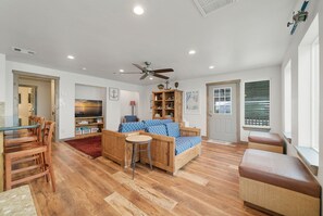 Smart TV, books - 7 Palms | 4BR Waterfront Home with Patio, Grill, Bar Area & Water Views (Rockport)