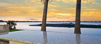 7 Palms | 4BR Waterfront Home with Patio, Grill, Bar Area & Water Views