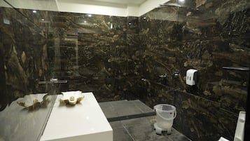 Shower, towels, soap, shampoo