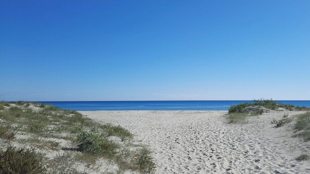 Solsenger og strandhåndklær