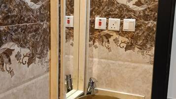 Shower, free toiletries, towels, soap