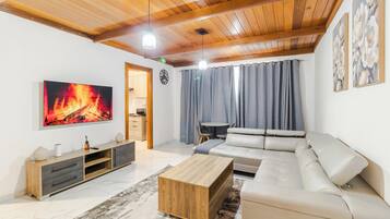 Apartment | Living area | 43-inch Smart TV with digital channels, Netflix, streaming services