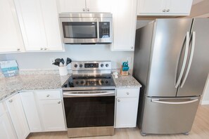 Private kitchen - 3-bedroom Condo in Ocean City: 1-Min Walk to Beach • Family-Friendly • Sleeps 8 (Ocean City)
