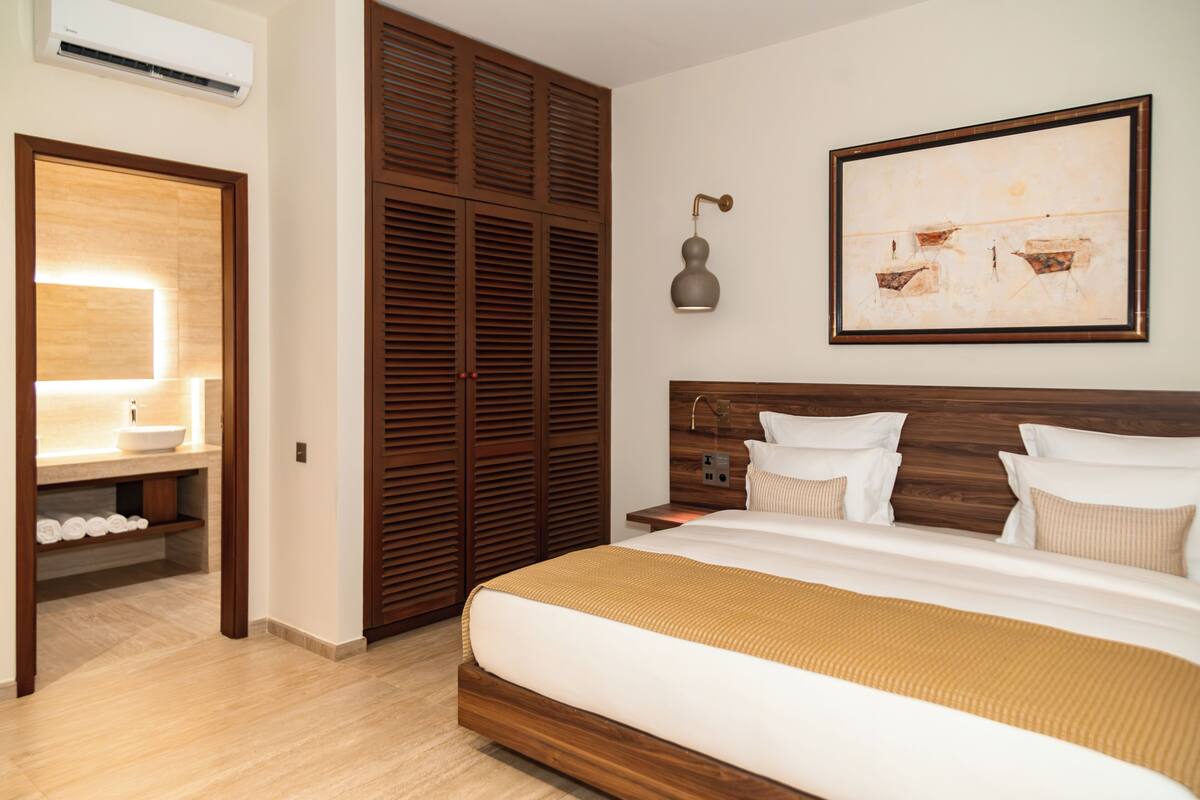 Villa BCC - Suite exécutive | Ropa de cama de alta calidad, camas con pillow-top y minibar 