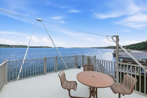 Outdoor dining - Deepwater Delight- Dock, Firepit & Patio overlooking the lake (Graford)