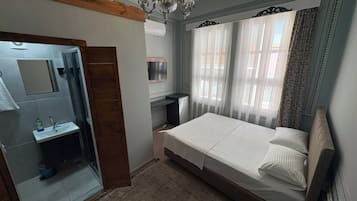 Family Room | Premium bedding, in-room safe, laptop workspace, blackout curtains