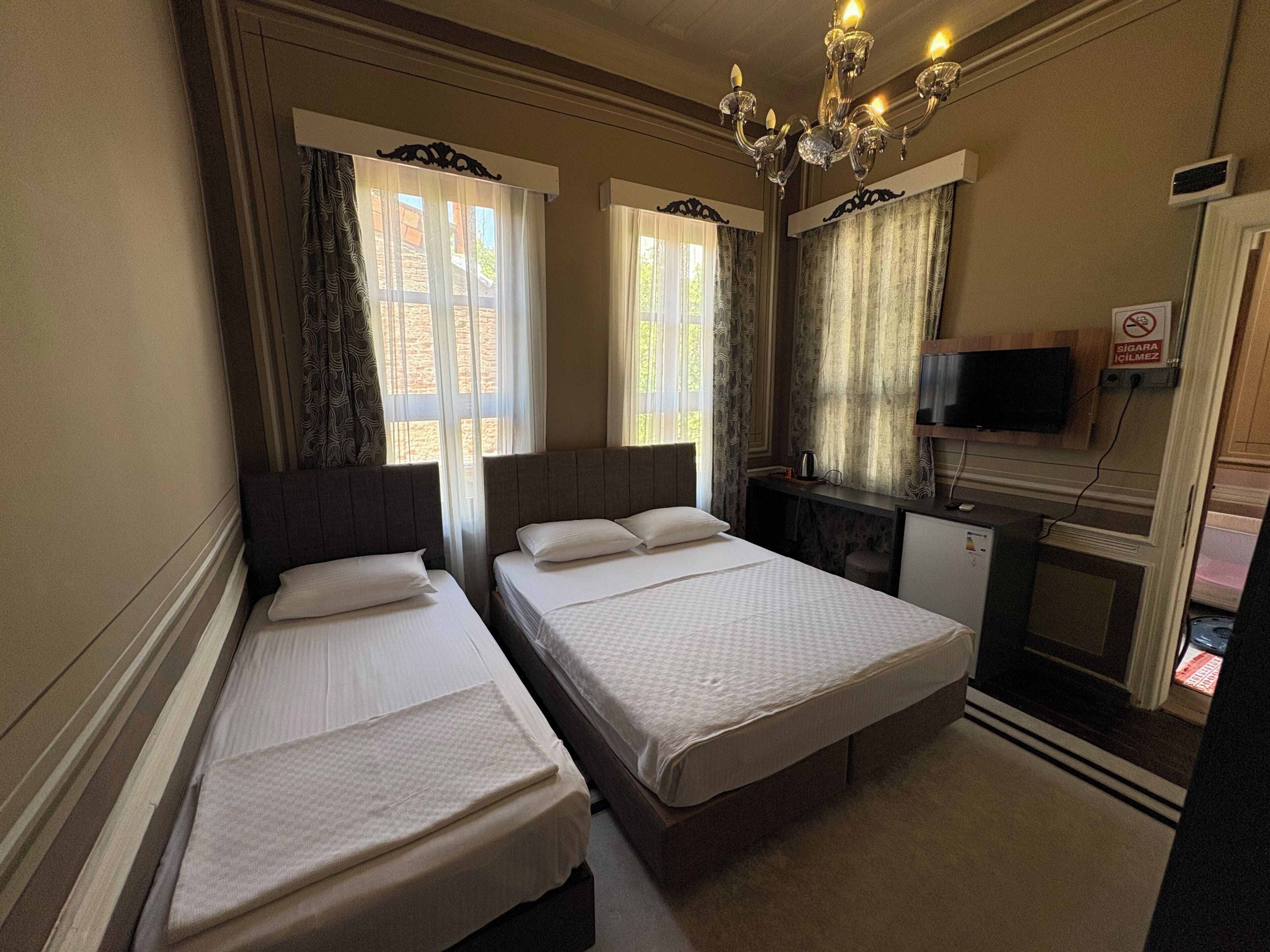 Standard Triple Room | Premium bedding, in-room safe, laptop workspace, blackout drapes