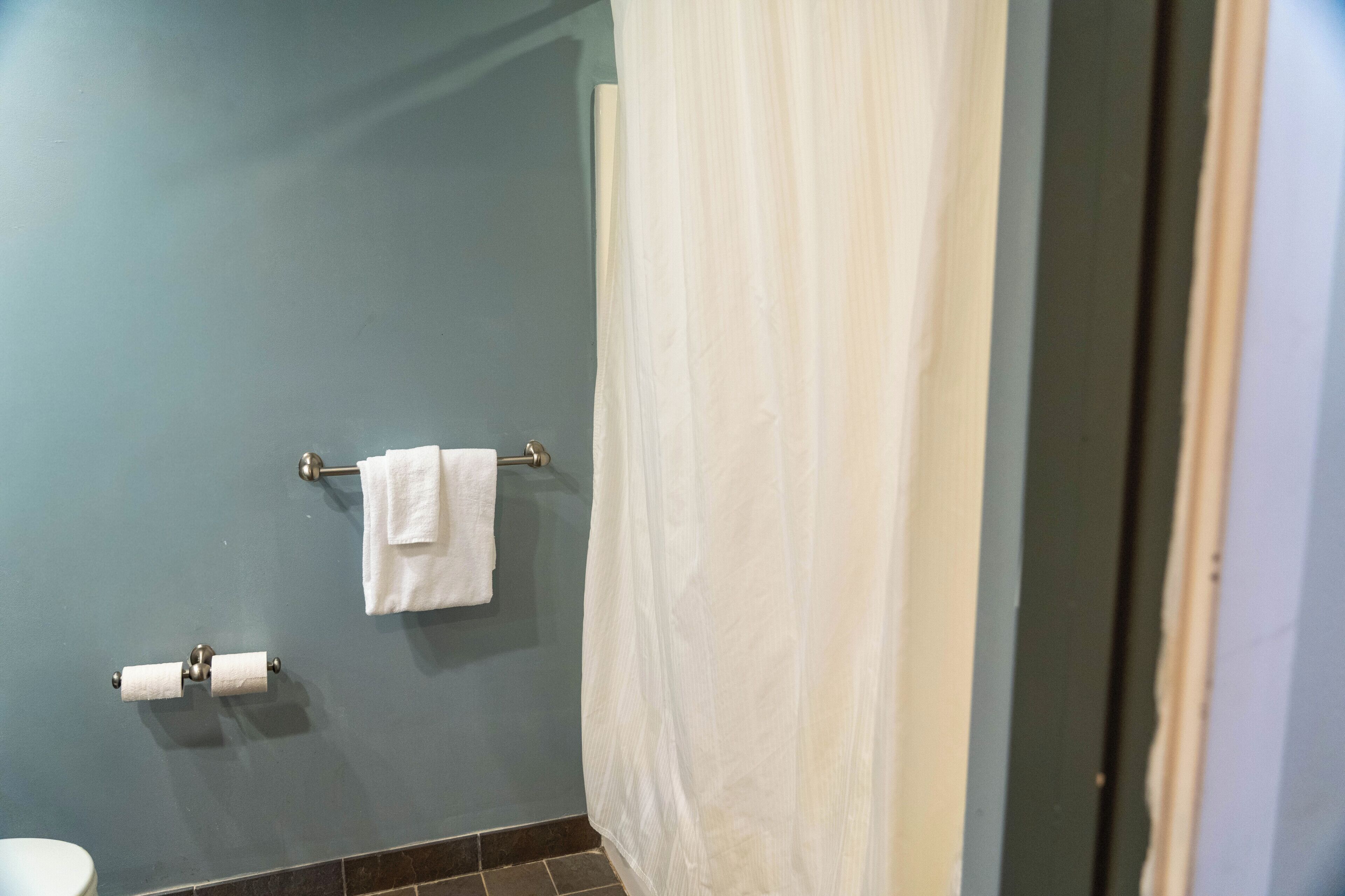 Hair dryer, towels, soap, toilet paper