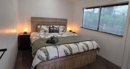 A Rustic 3 brm Farm House located on 25 acres in Ravenshoe with rock pools.