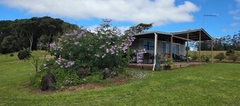 A Rustic 3 brm Farm House located on 25 acres in Ravenshoe with rock pools.