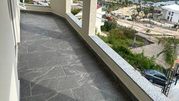 Deluxe Double Room, Balcony, City View | Property grounds