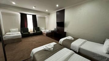 Superior Quadruple Room, City View | In-room safe, desk, free WiFi