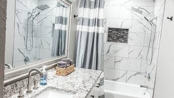 Hair dryer, towels, soap, toilet paper