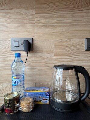 Coffee and/or coffee maker - Serene 1-bedroom bed & breakfast with AC in Dar es Salaam (Dar es Salaam)