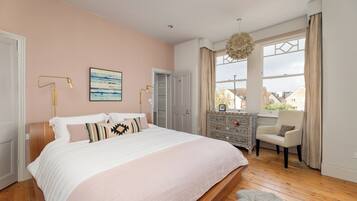 4 bedrooms, desk, iron/ironing board, travel cot