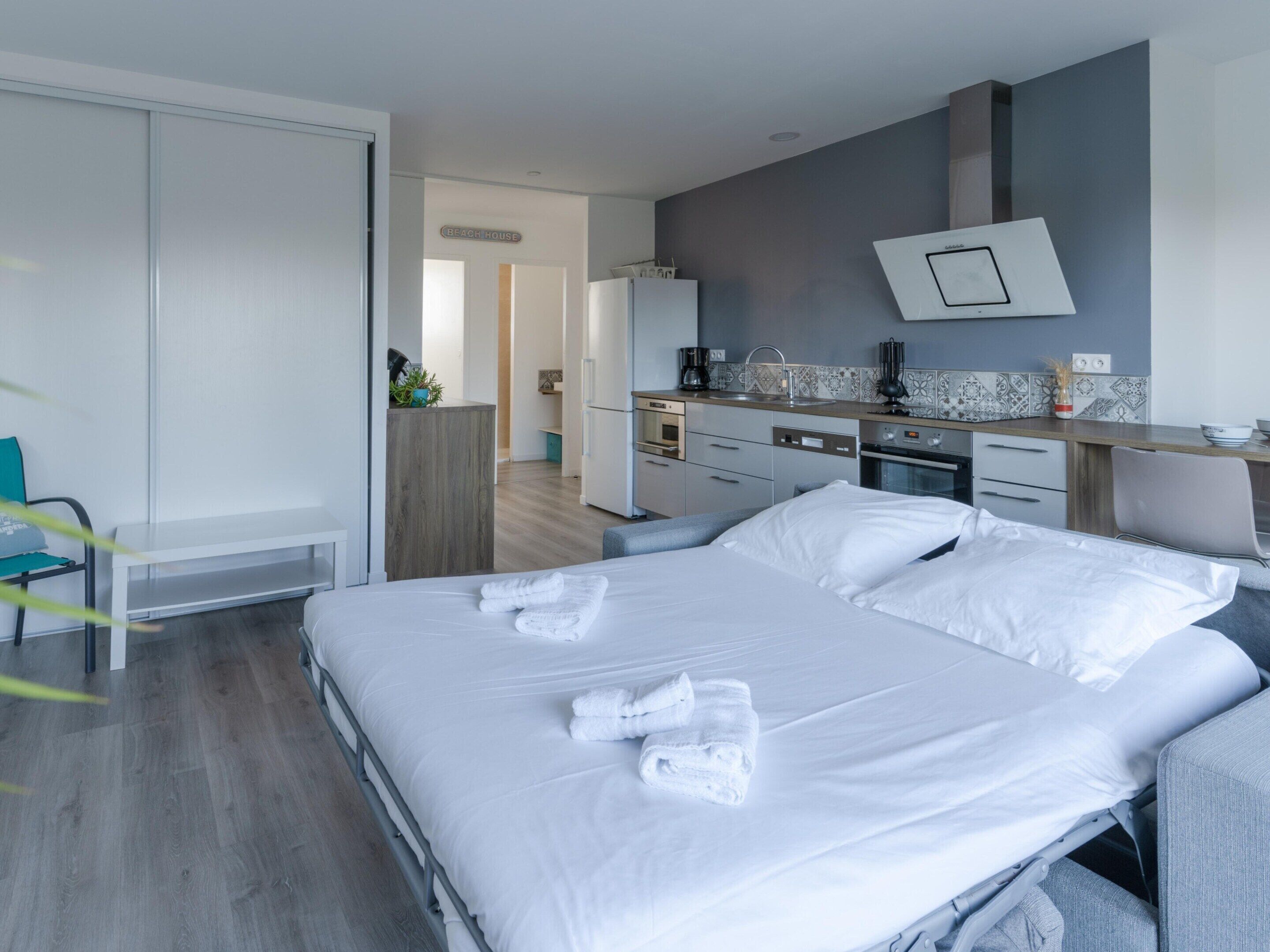 Apartemen | 1 kamar tidur, setrika/meja setrika, dan seprai linen