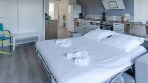 Apartemen | 1 kamar tidur, setrika/meja setrika, dan seprai linen