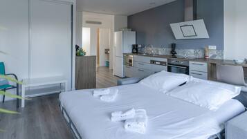 Apartemen | 1 kamar tidur, setrika/meja setrika, dan seprai linen
