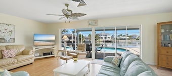 What a VIEW!!! Direct access waterway with dock. Key lot on cul de sac street.