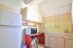A compact kitchen with a refrigerator, microwave, and sink. - ACROPOLIS VIEW -100% authentic Athens experience❤️ (Athina)
