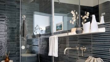Shower, hair dryer, towels, soap
