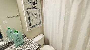 Hair dryer, towels, soap, toilet paper