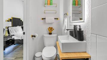 Hair dryer, towels, soap, toilet paper