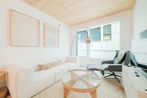 Suite, 2 chambres | Aire de séjour