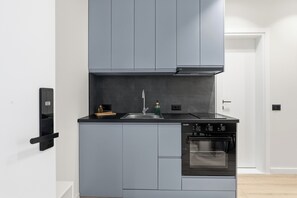 Family Apartment, Patio, Garden Area | Private kitchen
