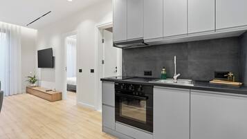 Apartament familiar, pati, zona enjardinada | Cuina privada