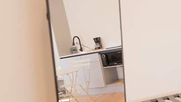 Desk, laptop workspace, blackout curtains, iron/ironing board