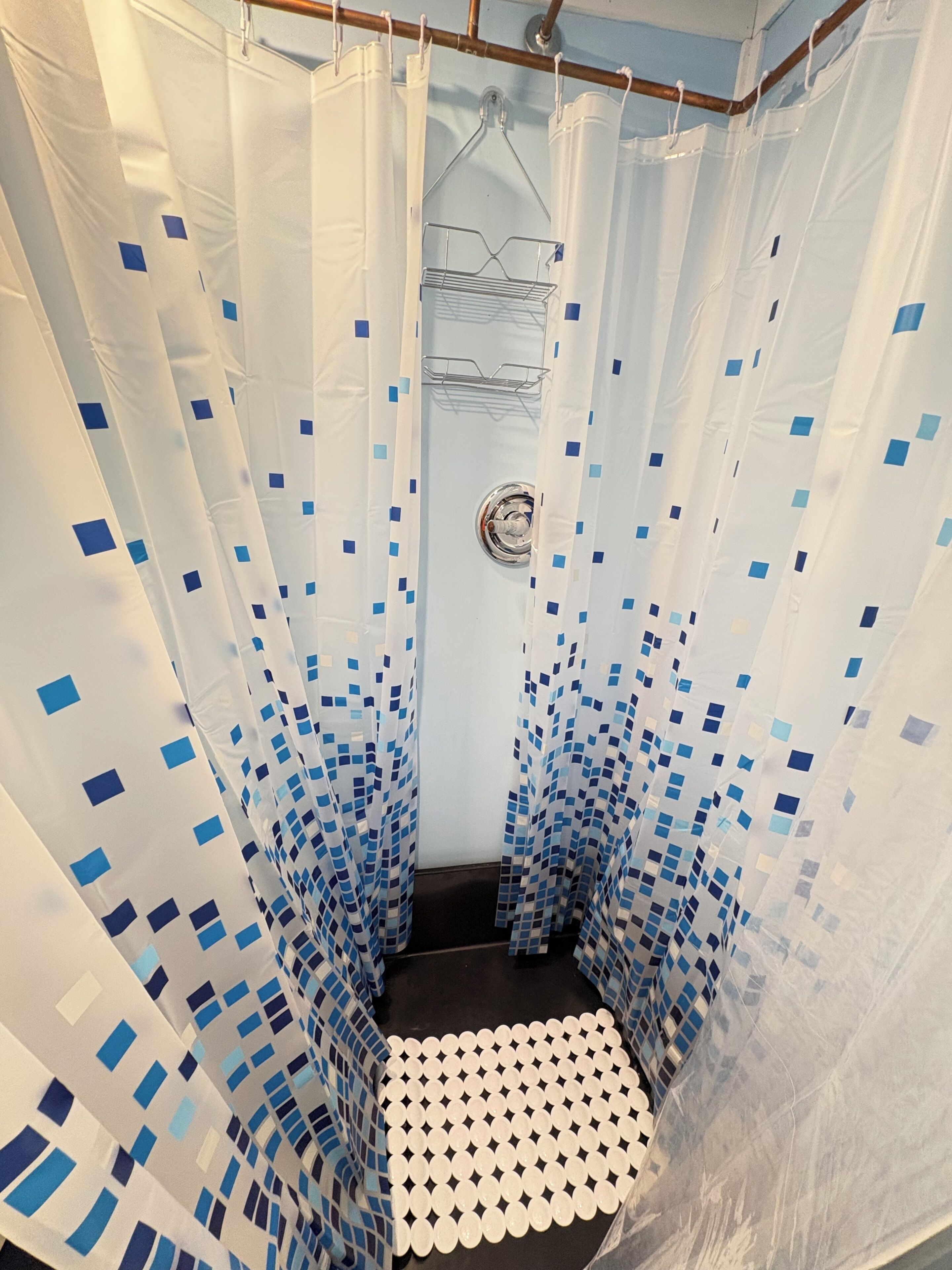 Shower, towels, soap, toilet paper