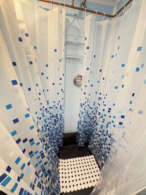 Shower, towels, soap, toilet paper