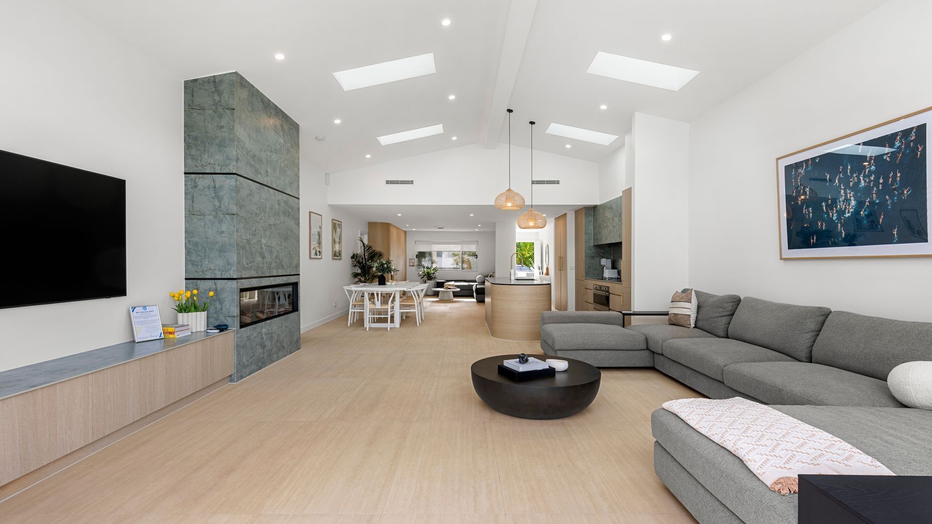 Smart TV, fireplace, books, stereo
