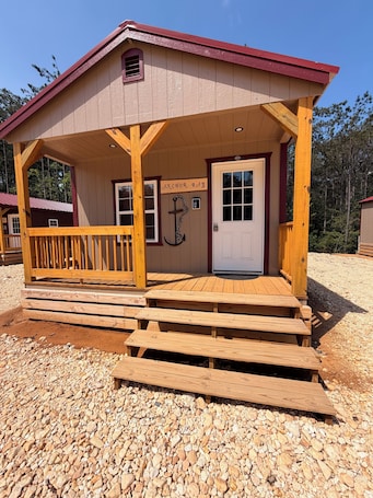 Exterior detail. BRAND NEW!! 1 bedroom cabin with two beds and a large couch. Near pickwick lake