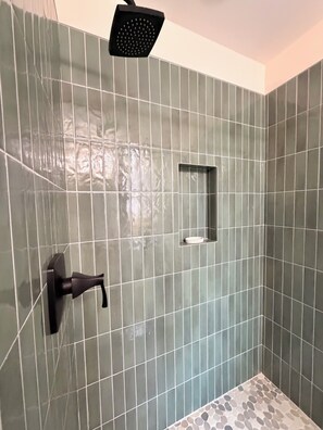 Shower, towels, soap, toilet paper