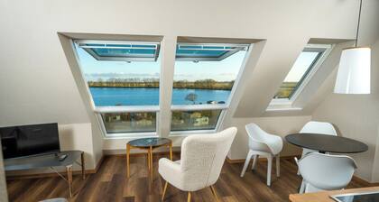 Attic apartment Stichling with views of the Eider