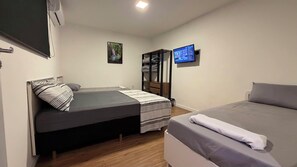 4 habitaciones, tabla de planchar con plancha y wifi gratis 