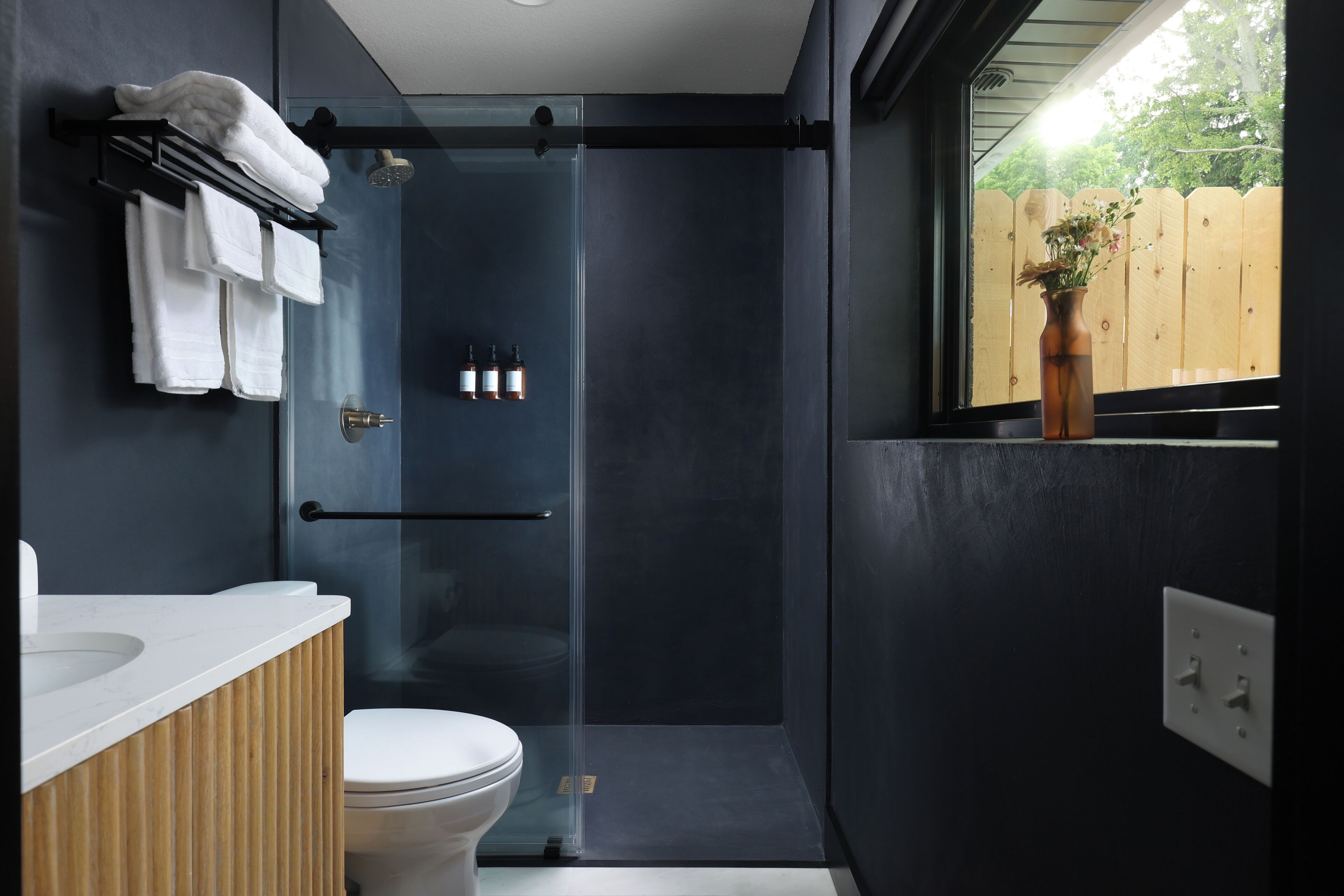 Shower, hair dryer, towels