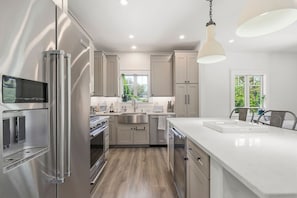Fridge, microwave, oven, stovetop - Designer Home with Wraparound Porches & Fire Pit (Bourne)