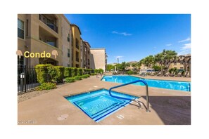 Outdoor pool, a heated pool - Gated Community 2 Bedroom Condo + Excellent Amenities 30 days + Surprise AZ (Surprise)